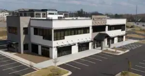 Building that houses the Cumming location of Goodman Dermatology office in Georgia