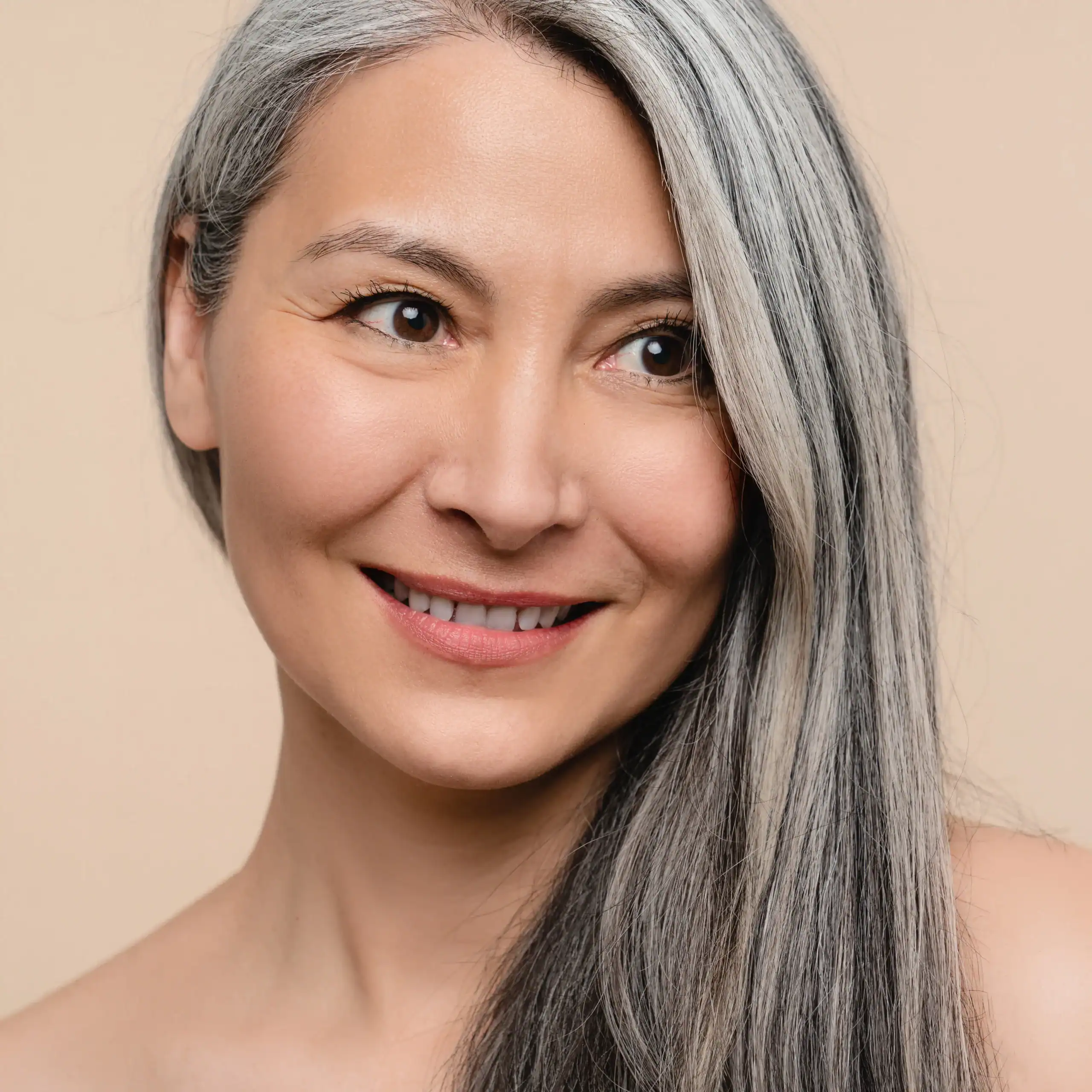 Middle-aged woman with pink cheeks