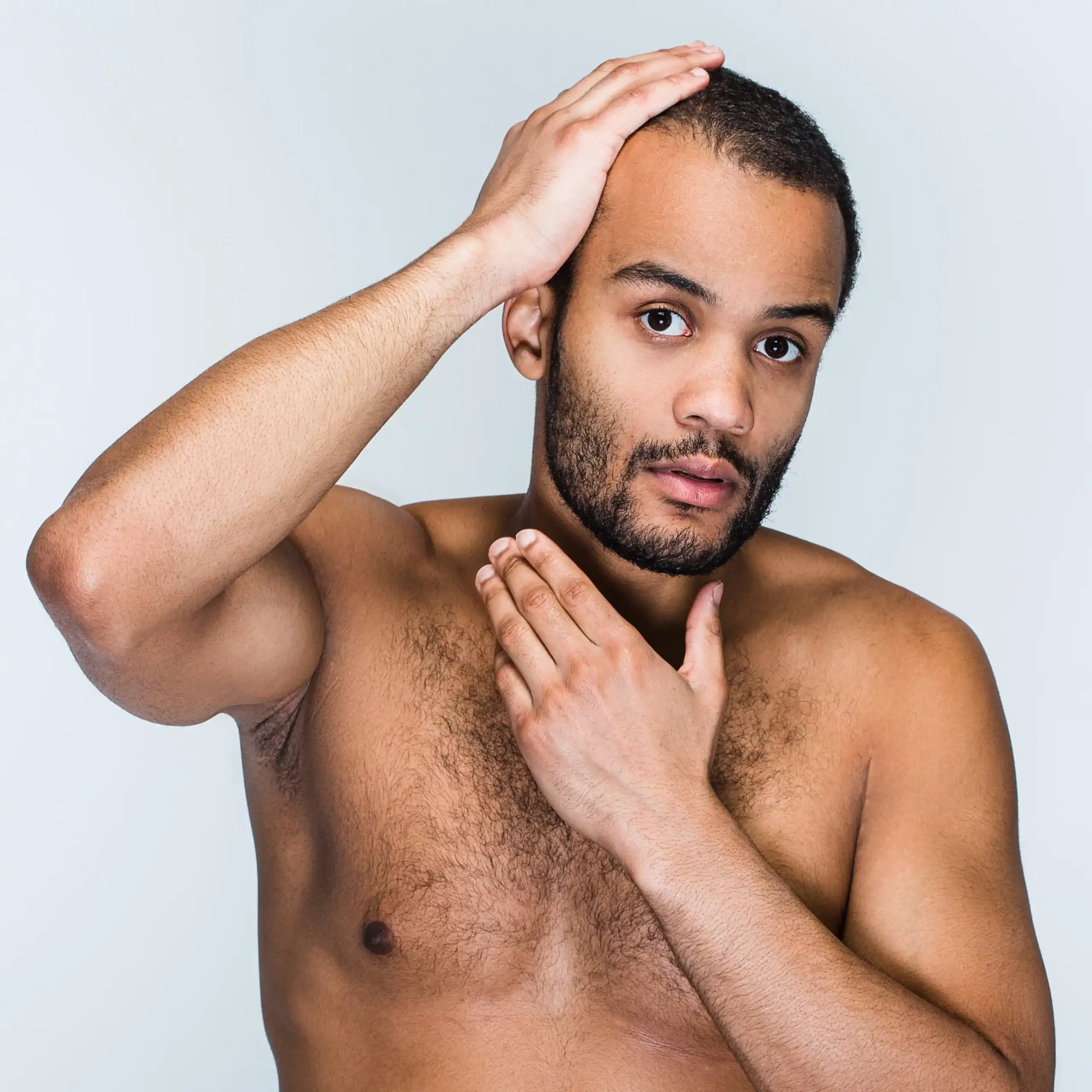 Handsome Black man worried about hair loss
