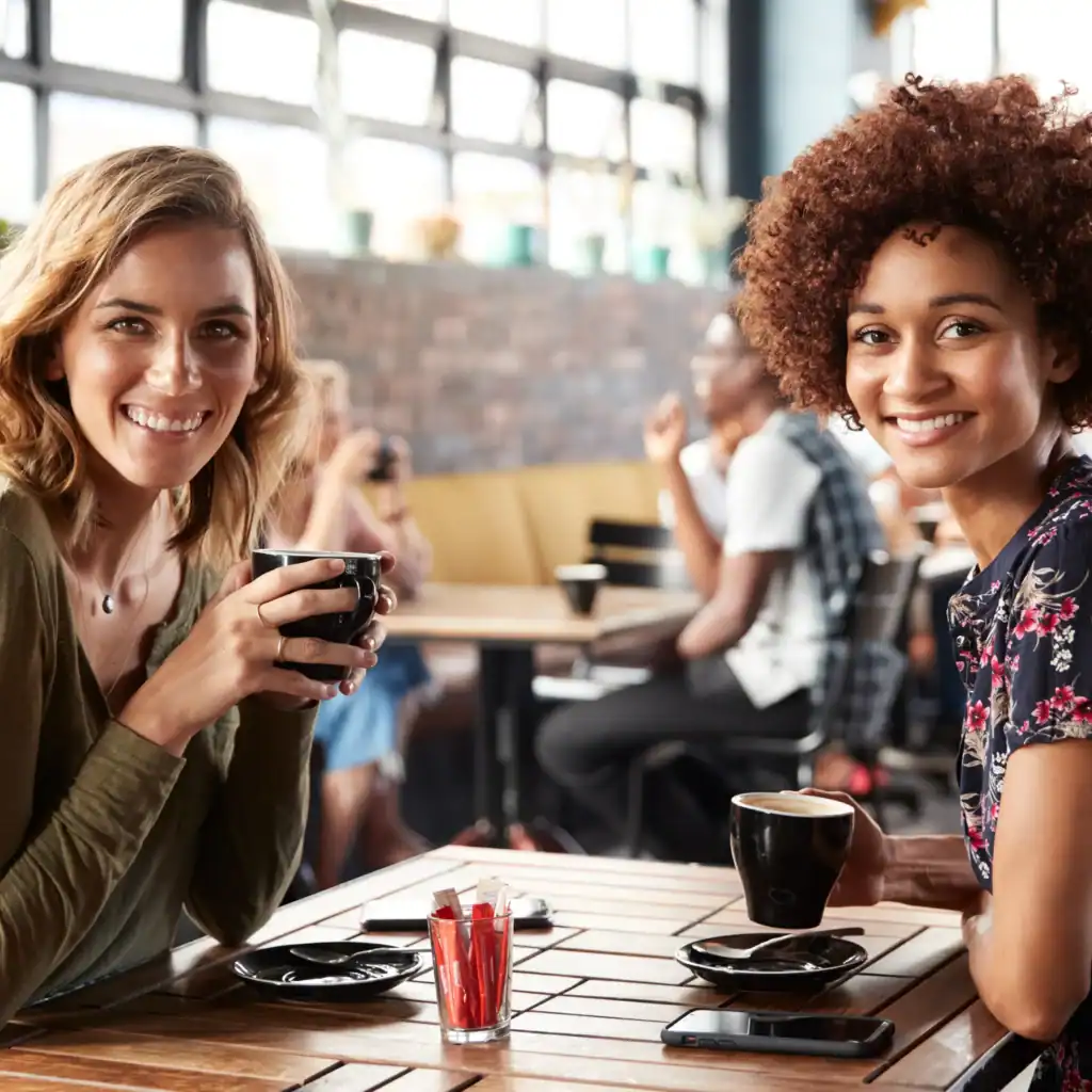 two women at coffee shop in metro Atlanta